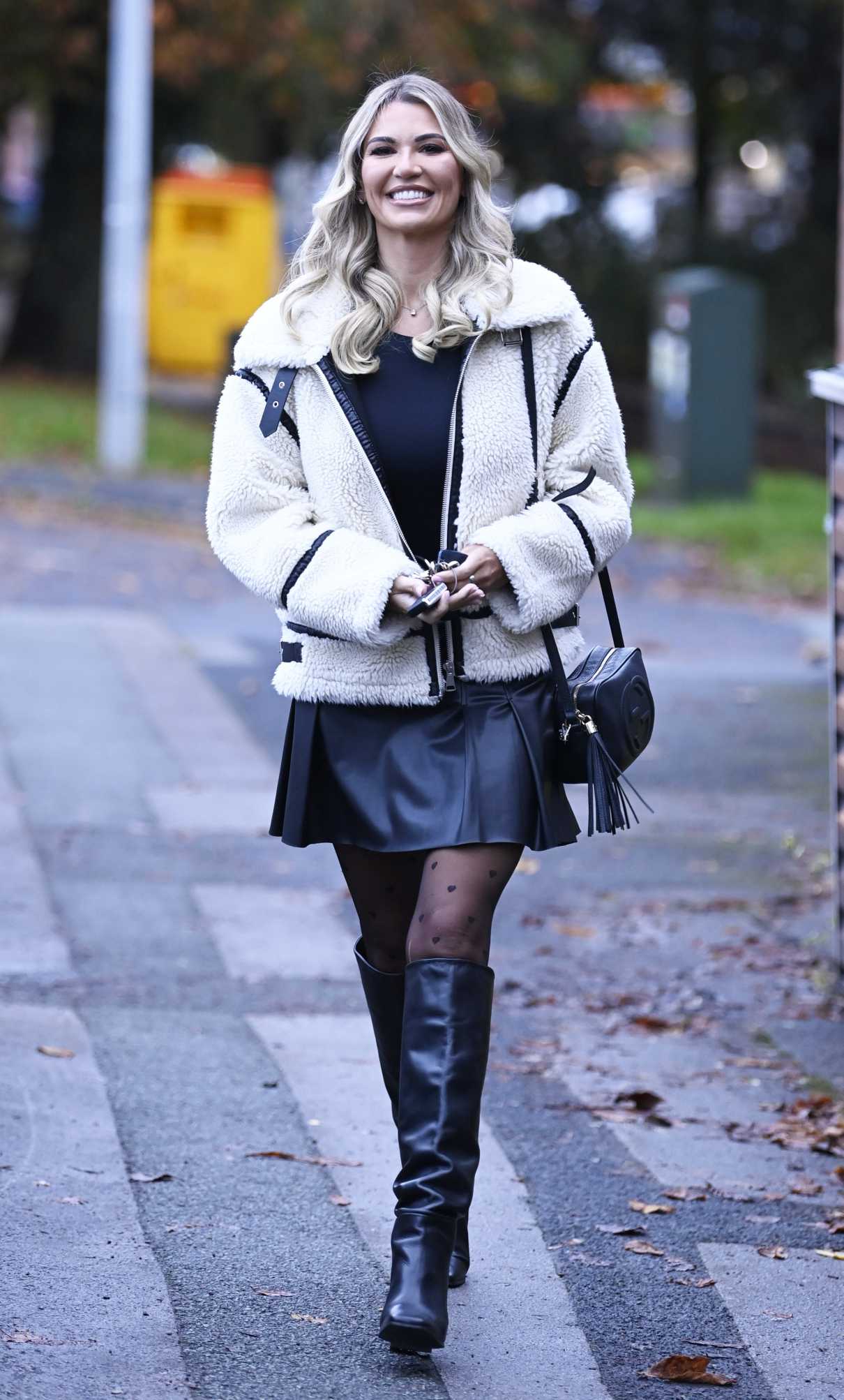 Christine McGuinness in a Black Knee-Length Boots