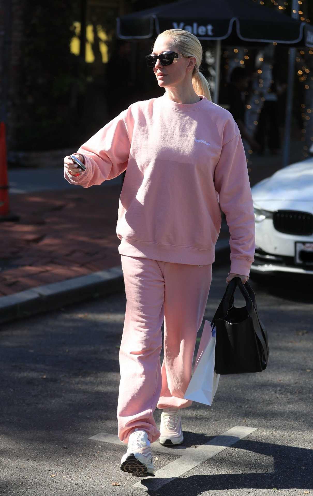 Erika Jayne in a Pink Sweatsuit Goes Shopping at Melrose Place in West ...