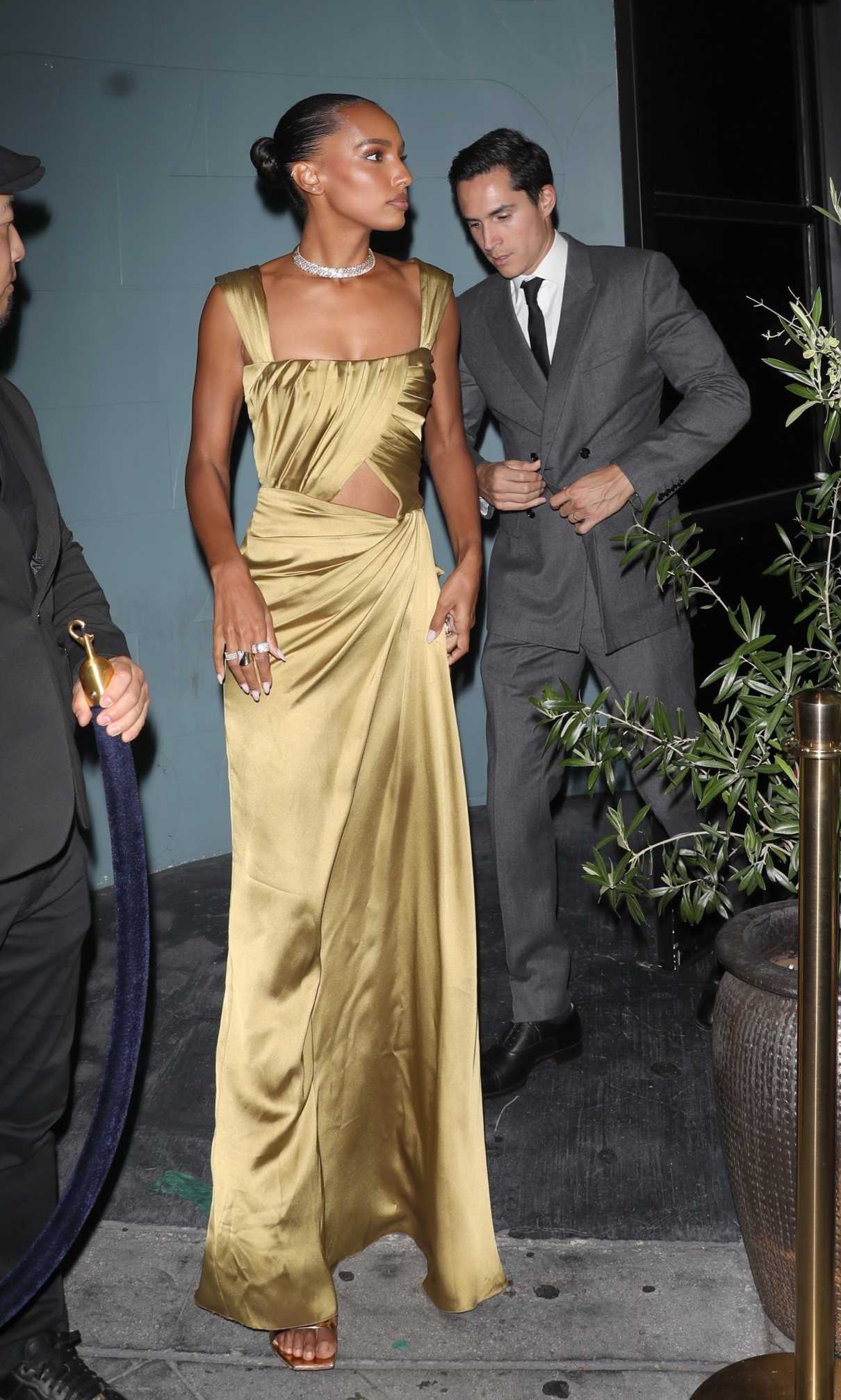 Jasmine Tookes in a Gold Dress