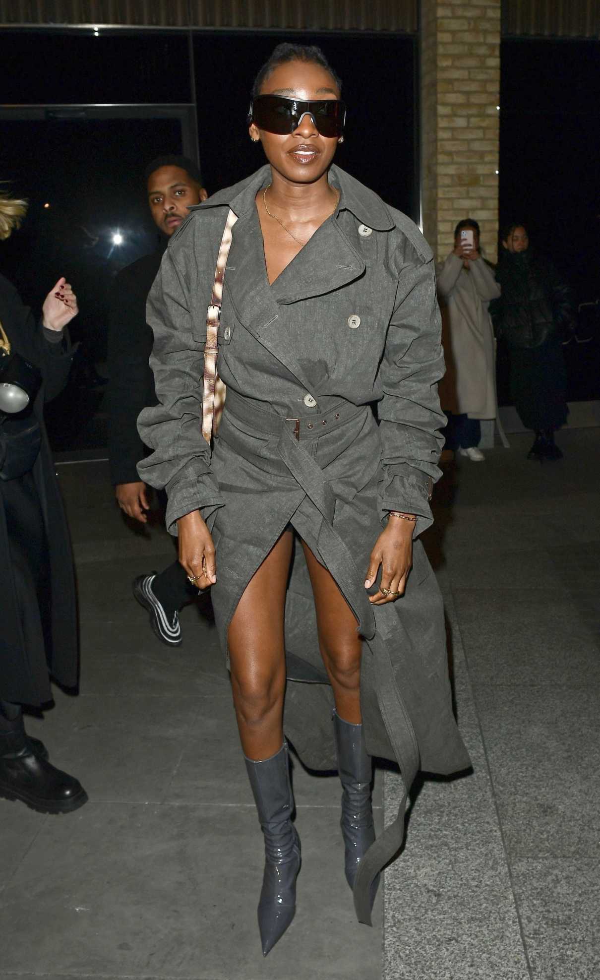 Little Simz in a Grey Trench Coat