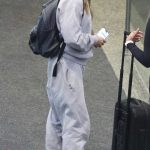 Melanie Chisholm in a Grey Sweatsuit Arrives at Sydney Airport in Sydney 11/17/2023