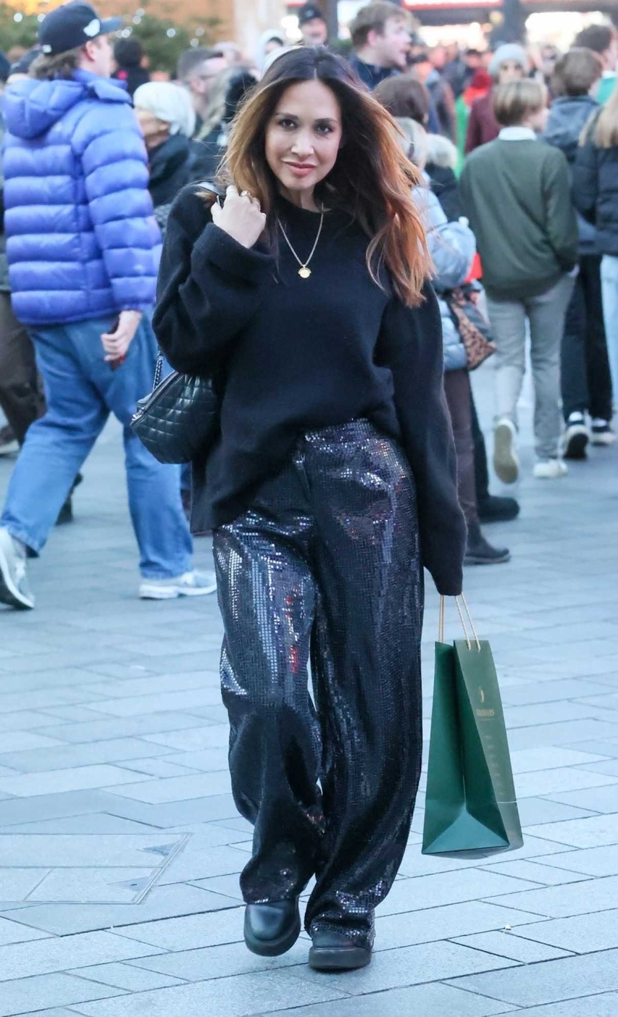 Myleene Klass in a Black Sweater