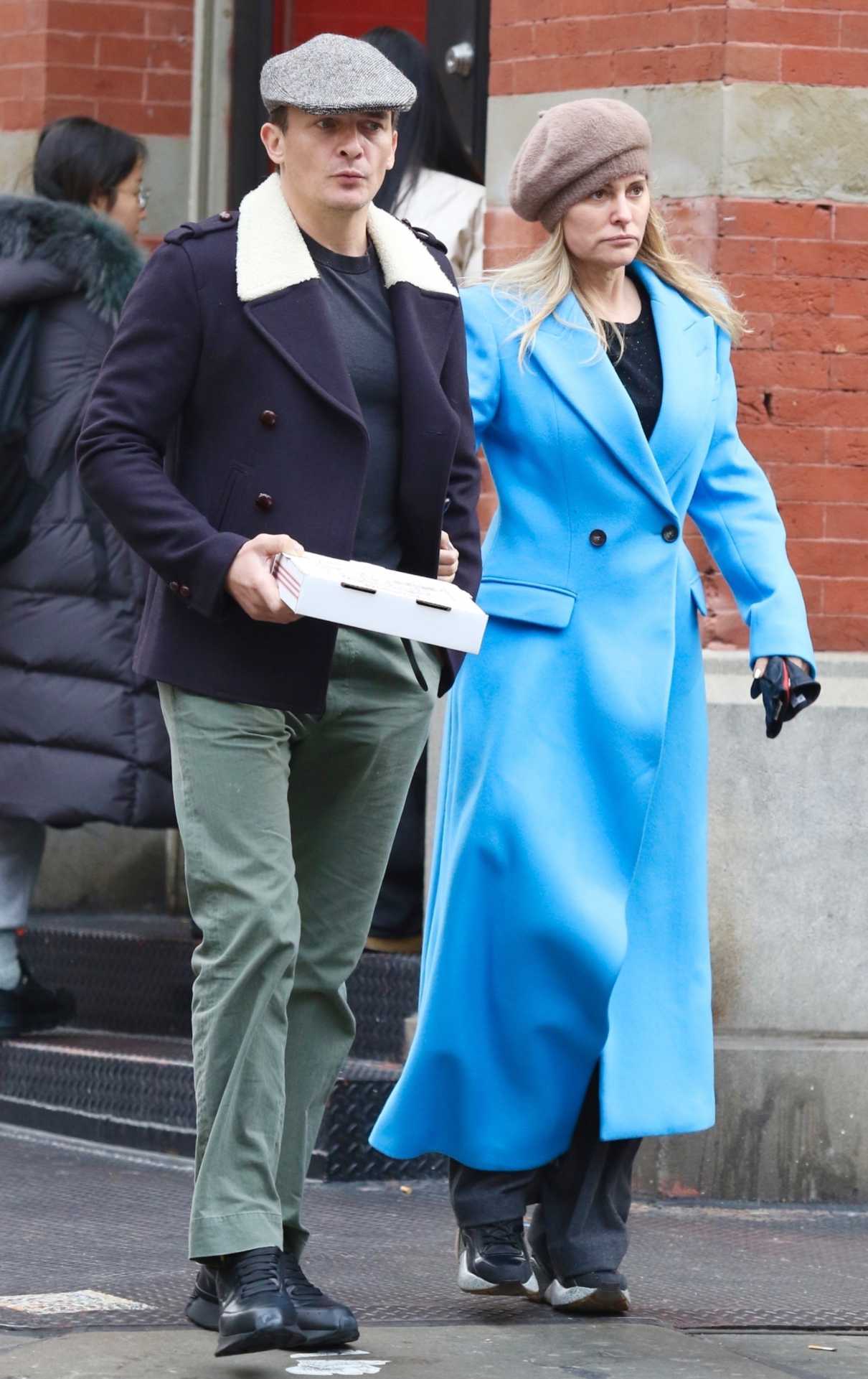 Aimee Mullins in a Baby Blue Coat