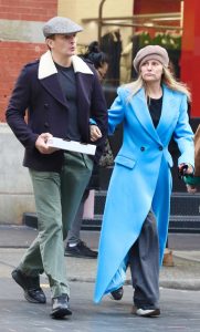 Aimee Mullins in a Baby Blue Coat