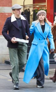 Aimee Mullins in a Baby Blue Coat