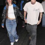 Anastasia Karanikolaou in a Blue Ripped Jeans Was Seen Out After Enjoying Dinner with Her Boyfriend Jayden Hossler in Beverly Hills 12/19/2023