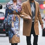 Chrissy Teigen in a Floral Print Trench Coat Was Seen Out with John Legend in New York 12/27/2023