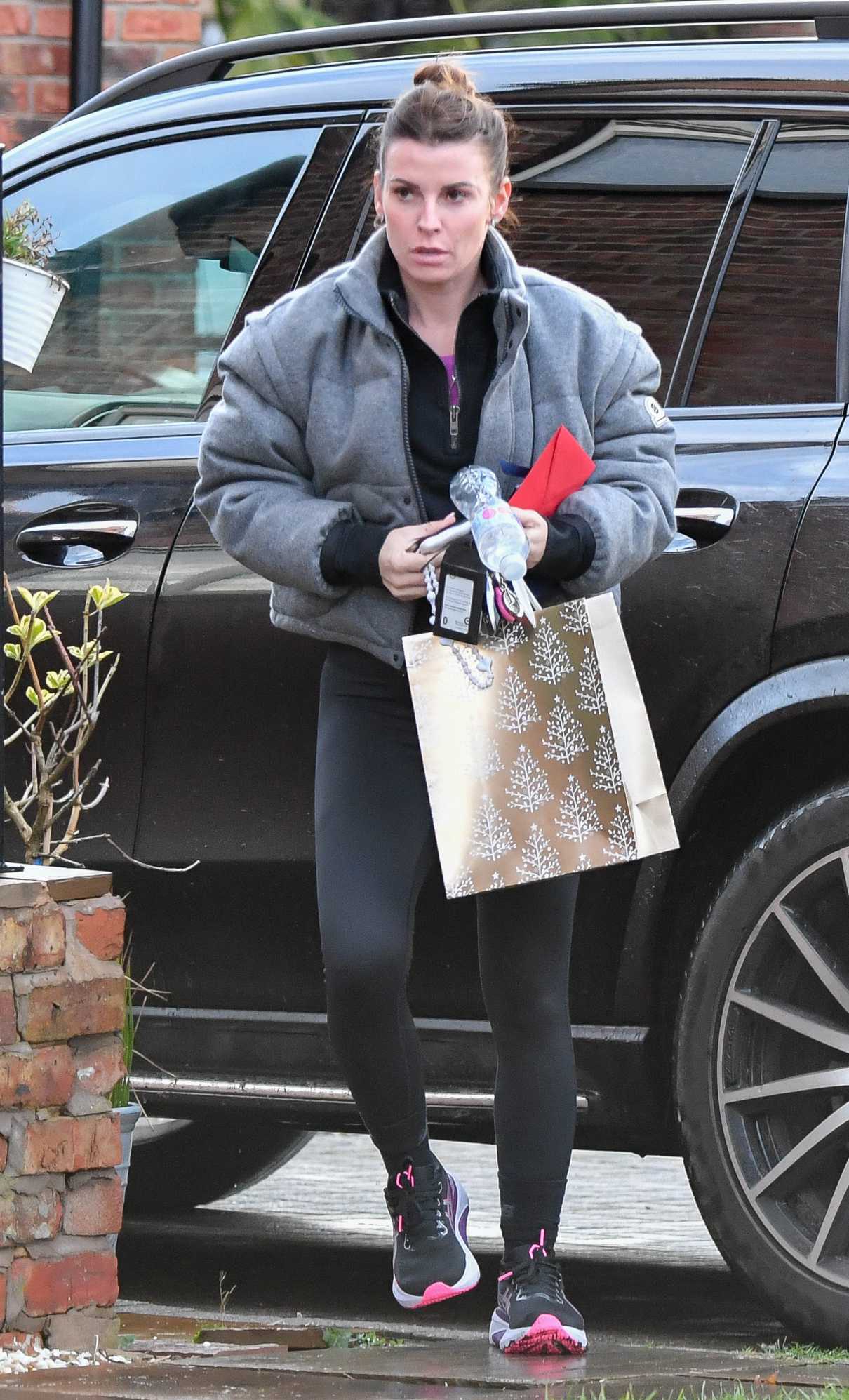 Coleen Rooney in a Grey Jacket