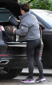 Coleen Rooney in a Grey Jacket