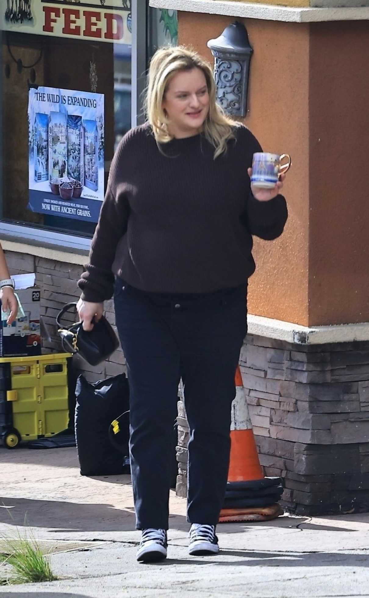 Elisabeth Moss in a Black Sweater