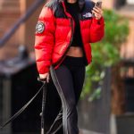 Emily Ratajkowski in a Red Jacket Takes Her Dog Colombo Out for a Walk in New York 12/19/2023
