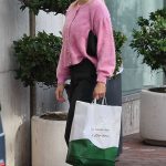 Emma Krokdal in a Pink Cardigan Enjoys Family Shopping Trip at Neiman Marcus in Los Angeles 12/27/2023