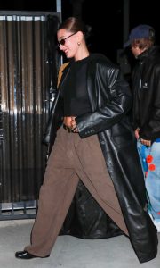 Hailey Bieber in a Black Leather Trench Coat