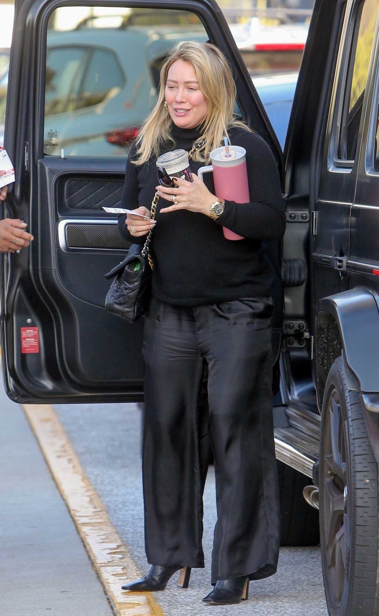Hilary Duff in a Black Sweater