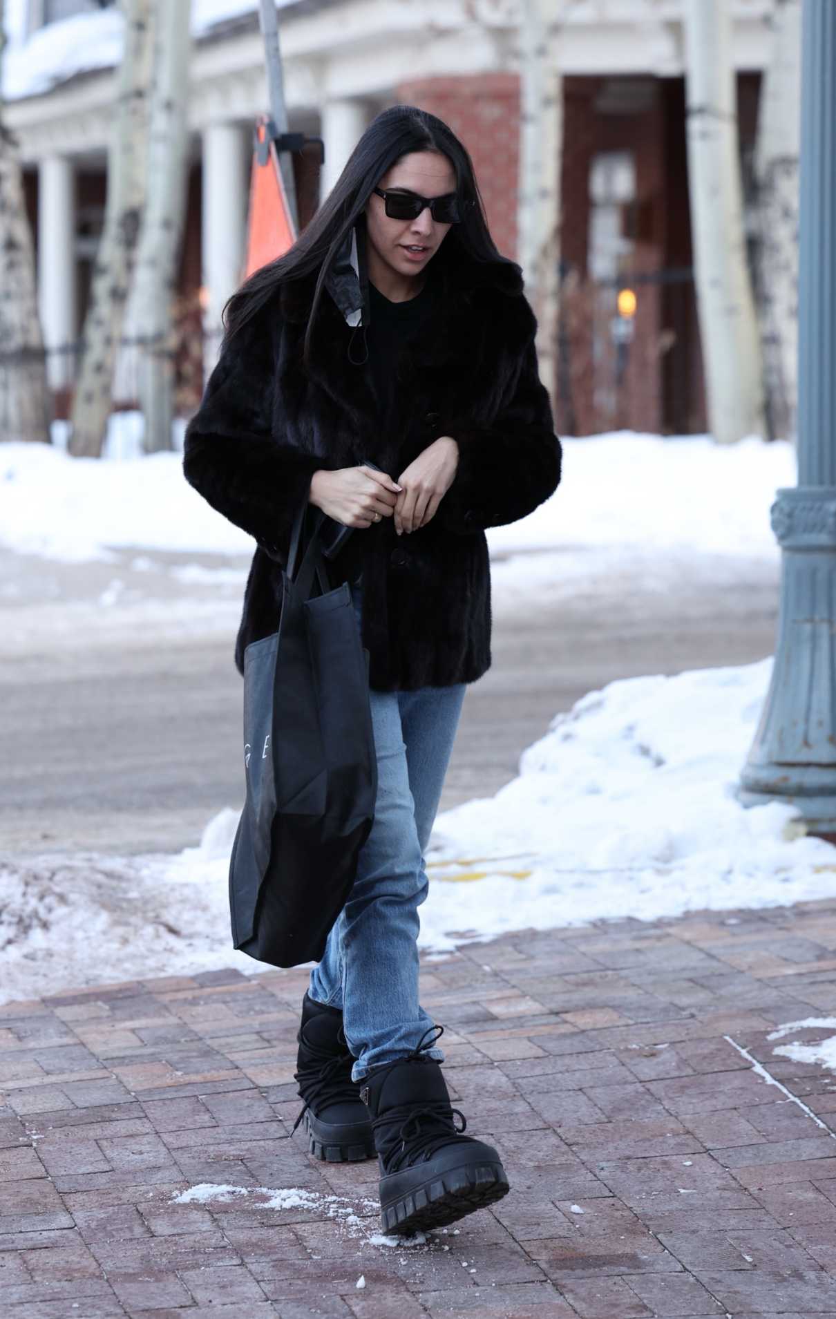 Noor Alfallah in a Black Fur Jacket