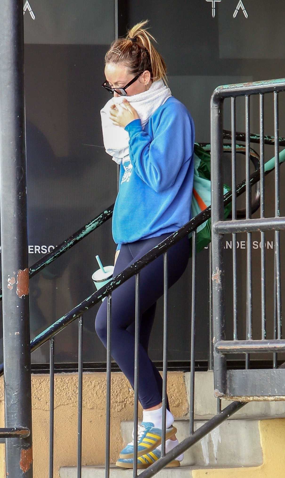 Olivia Wilde in a Blue Sweatshirt