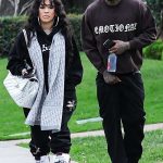 Saweetie in a Black Sweatsuit Heads to Polo Lounge for Lunch with YG in Beverly Hills 12/28/2023