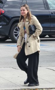 Addison Rae in a Beige Trench Coat