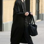 Elle Fanning in a Black Coat Leaves for Her Matinee Performance of Appropriate in New York 01/03/2024