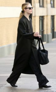 Elle Fanning in a Black Coat