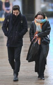 Ellie Leach in a Black Leather Coat