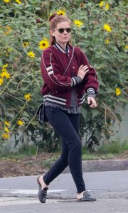 Kate Mara in a Maroon Jacket