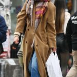 Katie Holmes in a Caramel Coloured Coat Does Some Shopping on New Year’s Eve in New York 12/31/2023