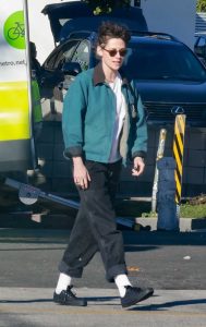 Kristen Stewart in a Turquoise Jacket