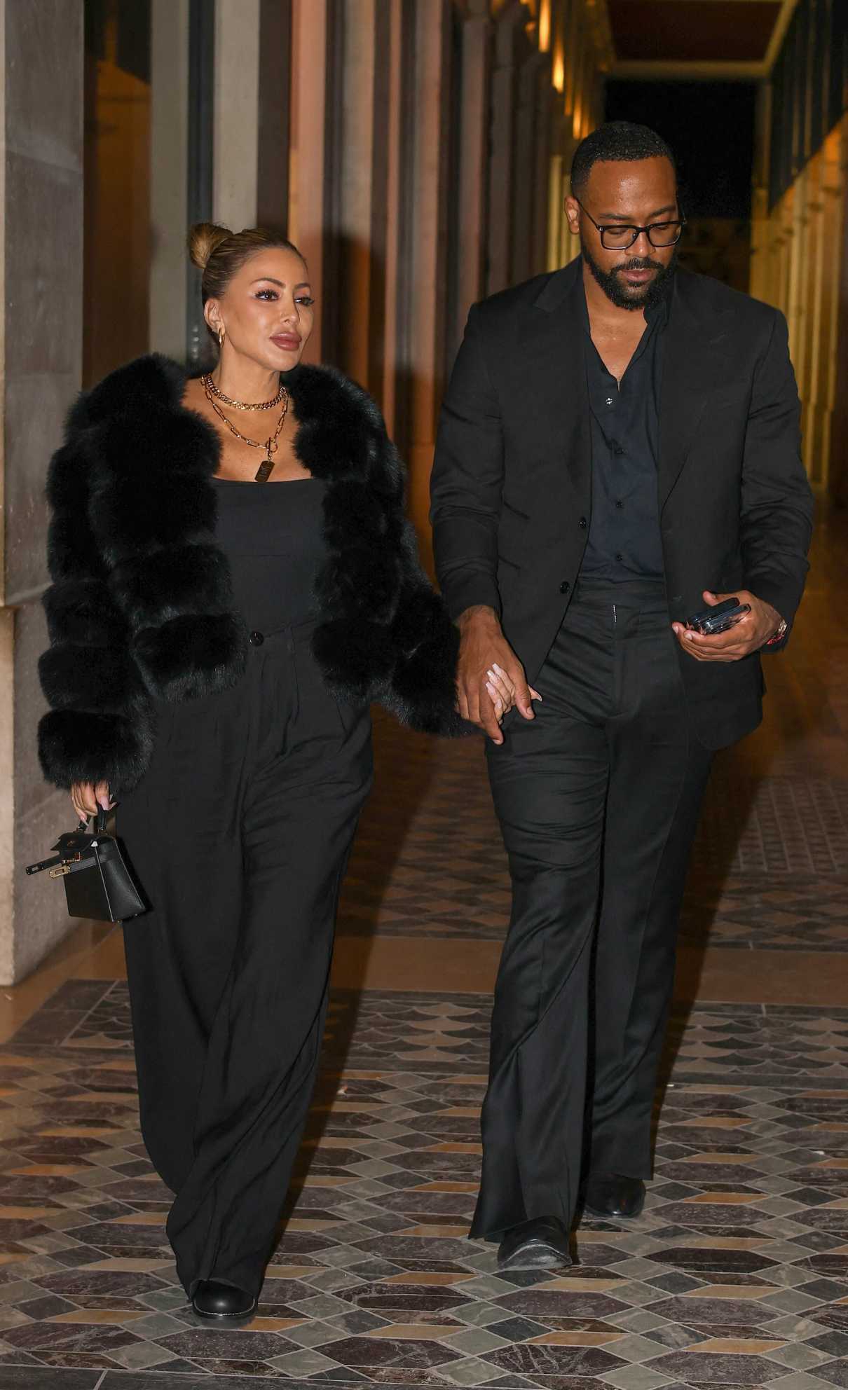 Larsa Pippen in a Black Fur Coat Leaves the Costes Restaurant with ...