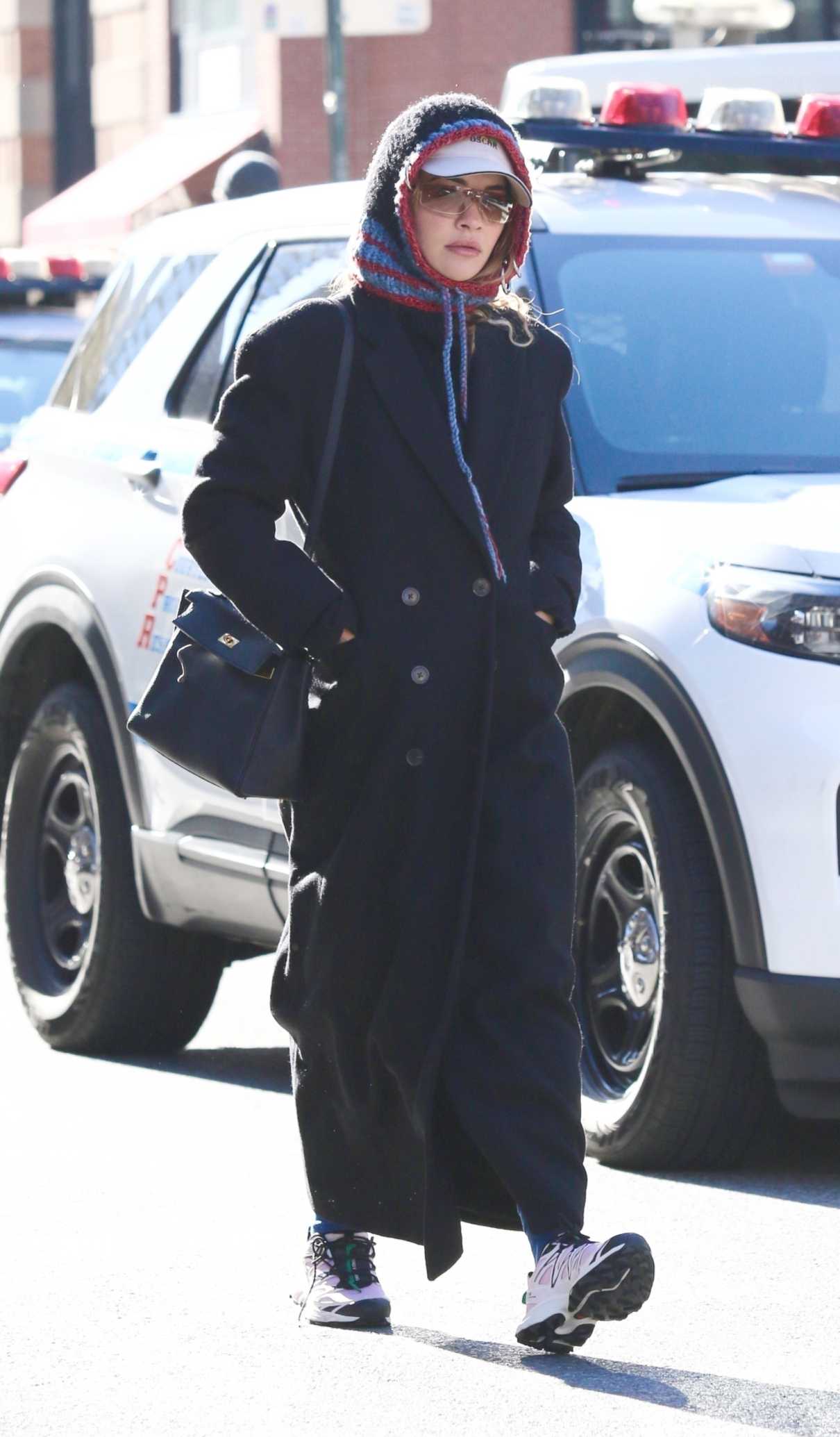 Rita Ora in a Black Coat