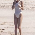 Dakota Johnson in a White Swimsuit on the Beach in Puerto Vallarta 02/20/2024