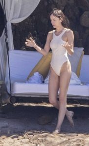 Dakota Johnson in a White Swimsuit