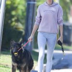 Gisele Bundchen in a Purple Hoodie Walks Her Dog in Miami 02/21/2024