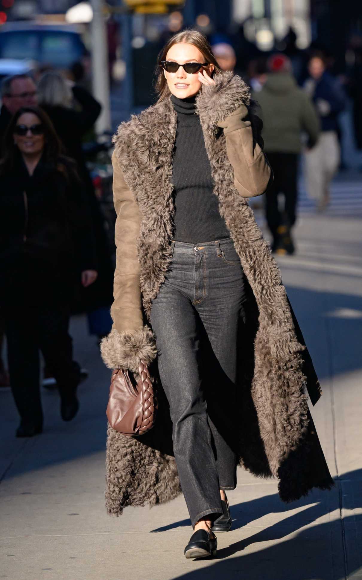 Karlie Kloss in a Brown Sheepskin Coat