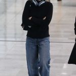Kiernan Shipka in a Black Sweater Arrives at Charles de Gaulle Airport in Paris 02/27/2024