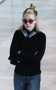Kiernan Shipka in a Black Sweater