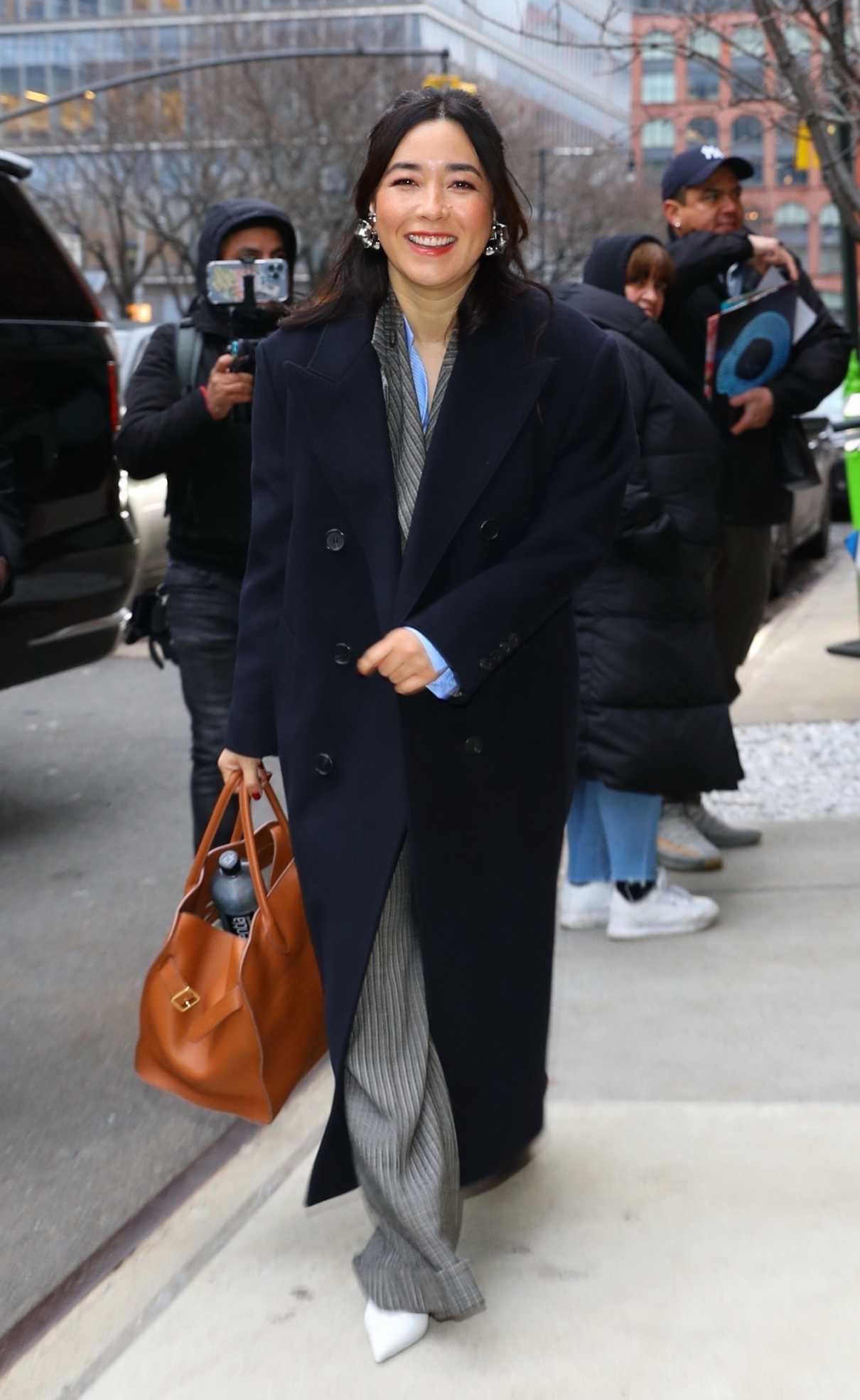 Maya Erskine in a Blue Coat