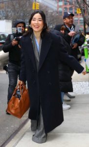 Maya Erskine in a Blue Coat