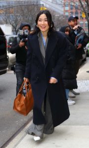 Maya Erskine in a Blue Coat