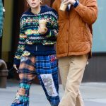 Millie Bobby Brown in a Plaid Colorful Pants Was Seen Out with Jake Bongiovi in New York City 02/19/2024