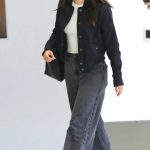Camila Mendes in a White Sneakers Arrives at LAX Airport in Los Angeles 03/11/2024