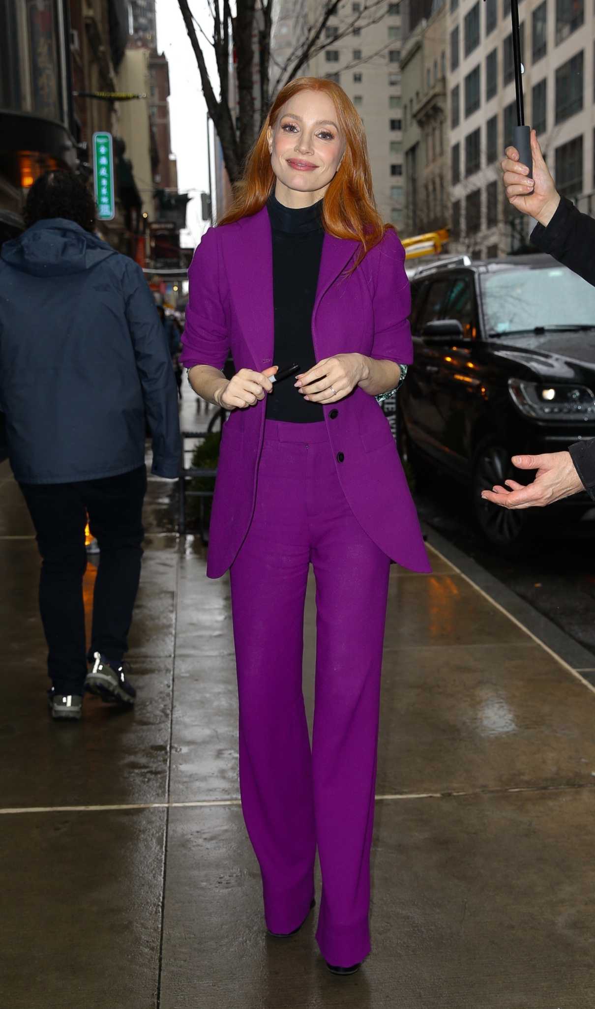 Jessica Chastain in a Purple Pantsuit