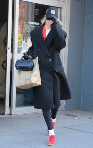 Gigi Hadid in a Red Adidas Sneakers