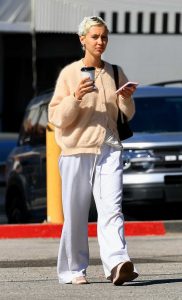 Iris Law in a White Sweatpants