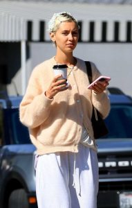 Iris Law in a White Sweatpants