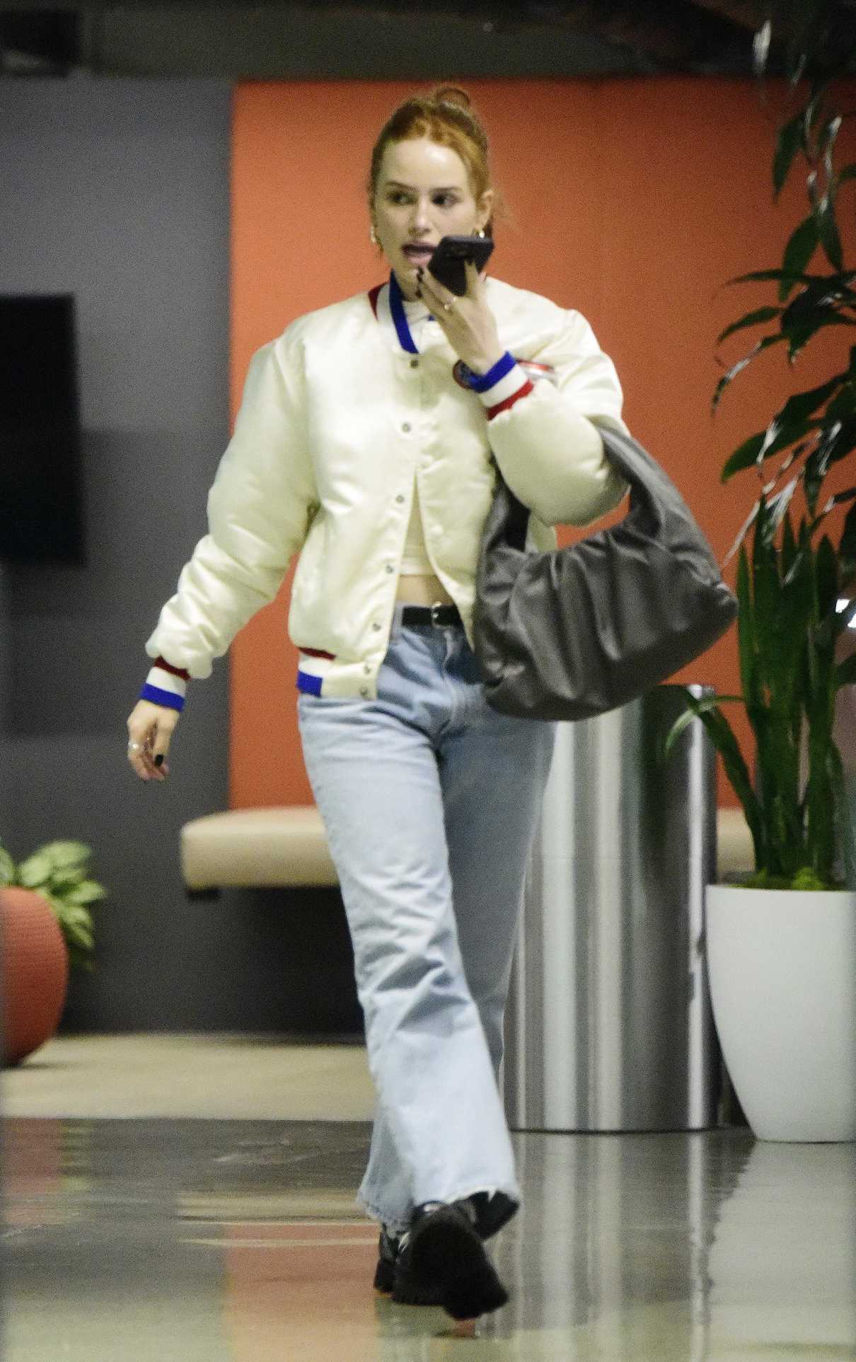 Madelaine Petsch in a White Bomber Jacket