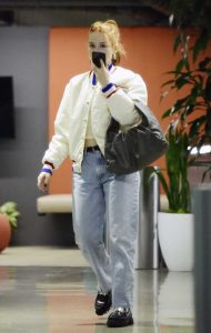 Madelaine Petsch in a White Bomber Jacket