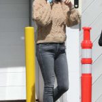 Mila Kunis in a Beige Sweater Was Seen Out in Bel Air 03/24/2024