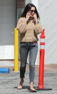 Mila Kunis in a Beige Sweater