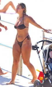 Natasha Oakley in a Brown Bikini